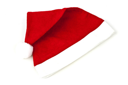 圣诞老人红色的帽子。在白色隔离
