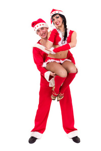 穿上圣诞老人衣服的快乐年轻夫妇
