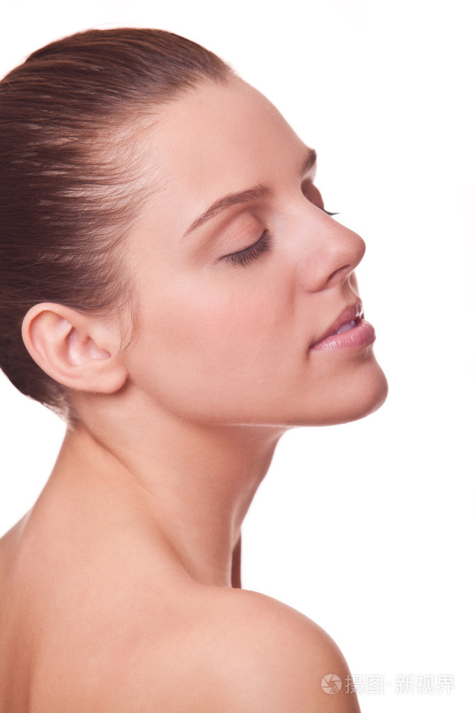 肖像美丽的年轻女子,干净的脸