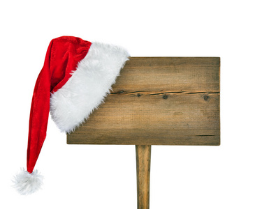 木路标志与孤立在白色背景上的圣诞老人帽子
