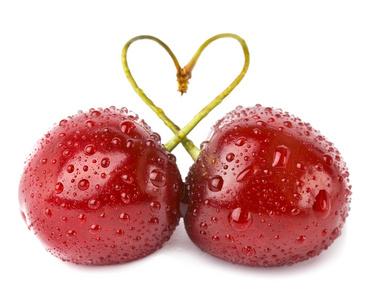 在一颗心捆绑在一起的两个樱桃图片