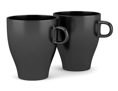 孤立在白色背景上的两个黑色陶瓷杯