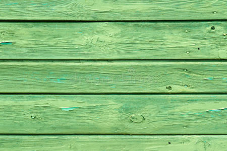 具有绿色背景的栅栏图片