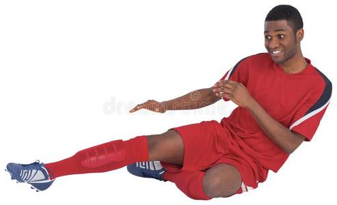 穿红色球衣的足球运动员图片