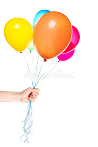 人类的手给飞舞的气球