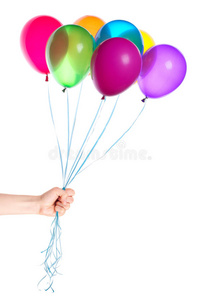 人类的手给飞舞的气球