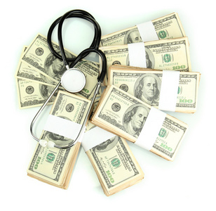 医疗成本的概念 听诊器和美元上白色孤立