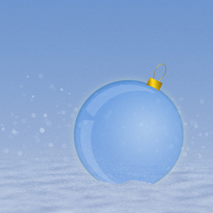 在雪上的蓝色球