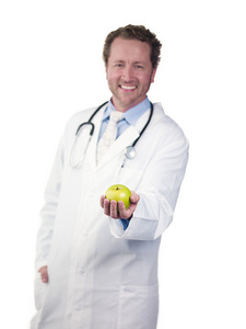 年轻的医生举行绿色苹果