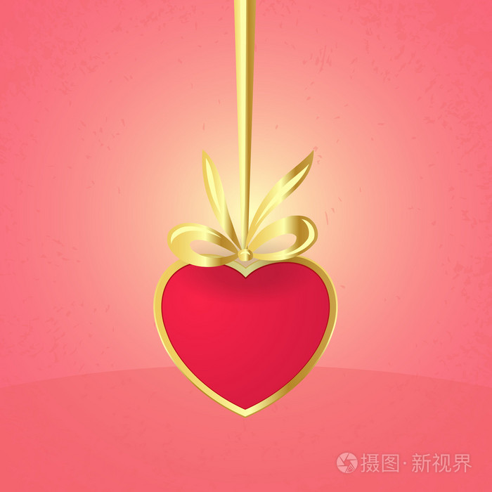 Hanging valentines heart with gold ribbon.