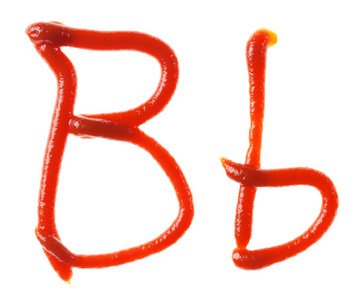 字母表字母由番茄 番茄酱糖浆被隔离