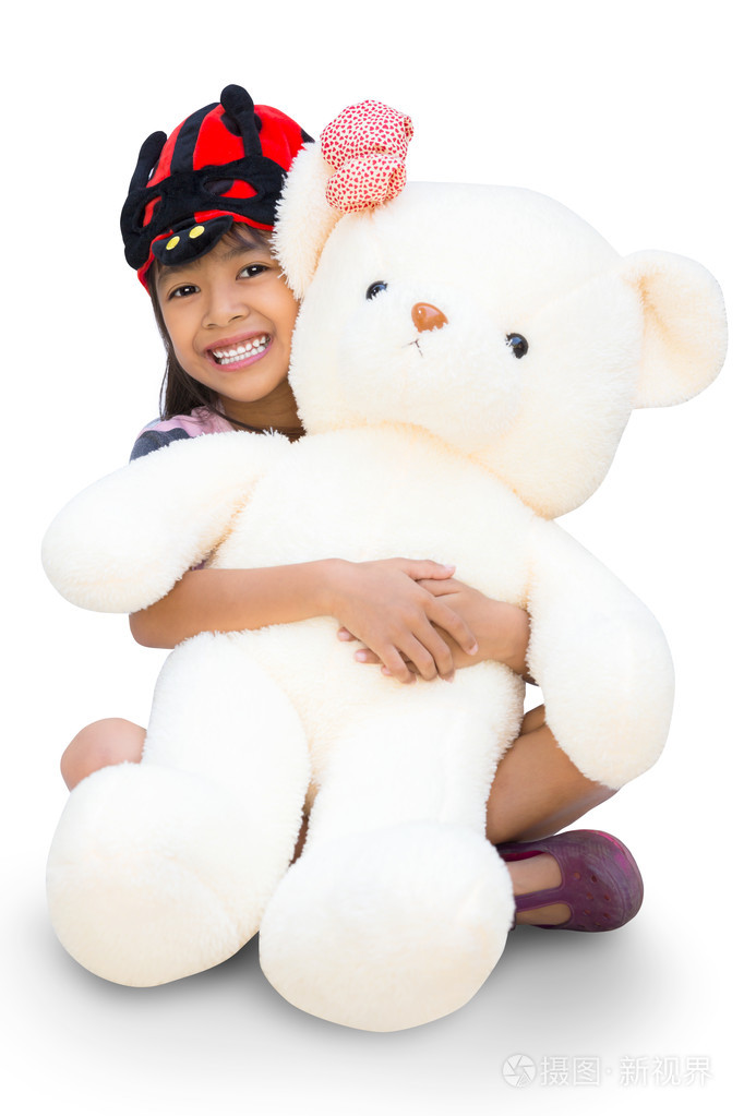 漂亮的小女孩抱着大熊