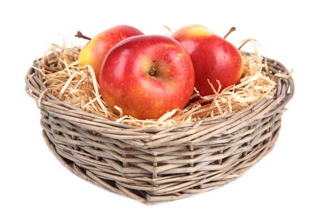 在篮子里的红苹果照片