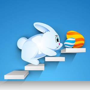在楼梯上，很开心美丽复活节彩蛋复活节兔