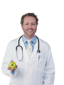 年轻的医生抱着青苹果的肖像