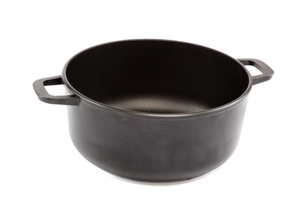 孤立的黑色泛孤立在白色背景上的黑色长柄锅照片