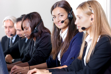 美丽的年轻商业客户服务女人照片