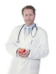 年轻医生抱着一只苹果的肖像