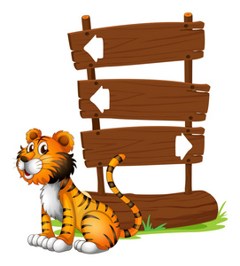 一只老虎在一个木制的招牌旁边