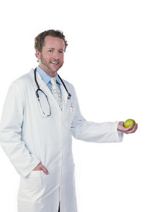 年轻的医生举行绿色苹果