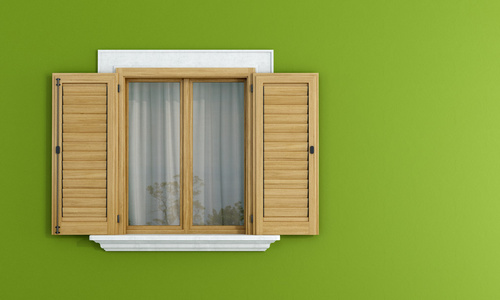 绿墙上的木窗口