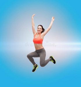 运动型少女穿着运动服跳跃