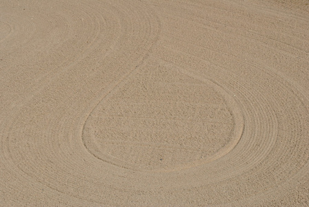 在砂带纹理的背景漩涡