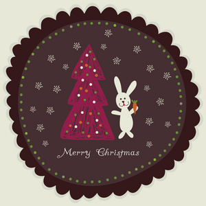 兔子胡萝卜圣诞节树附近举行圆架圣诞卡片