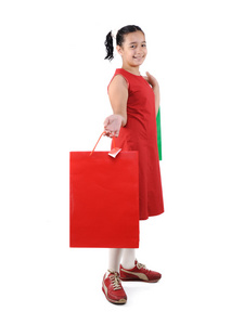 小女孩用购物袋和框孤立