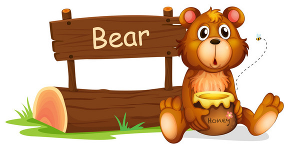 持在一个木制的招牌旁边的蜂蜜熊照片