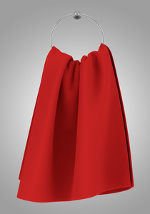 在灰色的背景上孤立的衣架上的红色毛巾