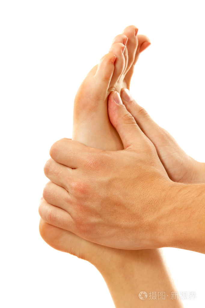 按摩脚女性特写上白色隔离