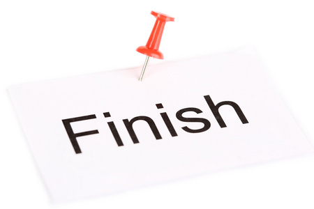 推针与字的纸上完成书面上它隔绝在白色照片