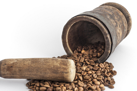 砂浆和杵与咖啡种子图片