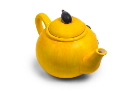 孤立的水壶黄色陶瓷茶壶茶