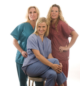 三个护士在医疗磨砂的衣服图片