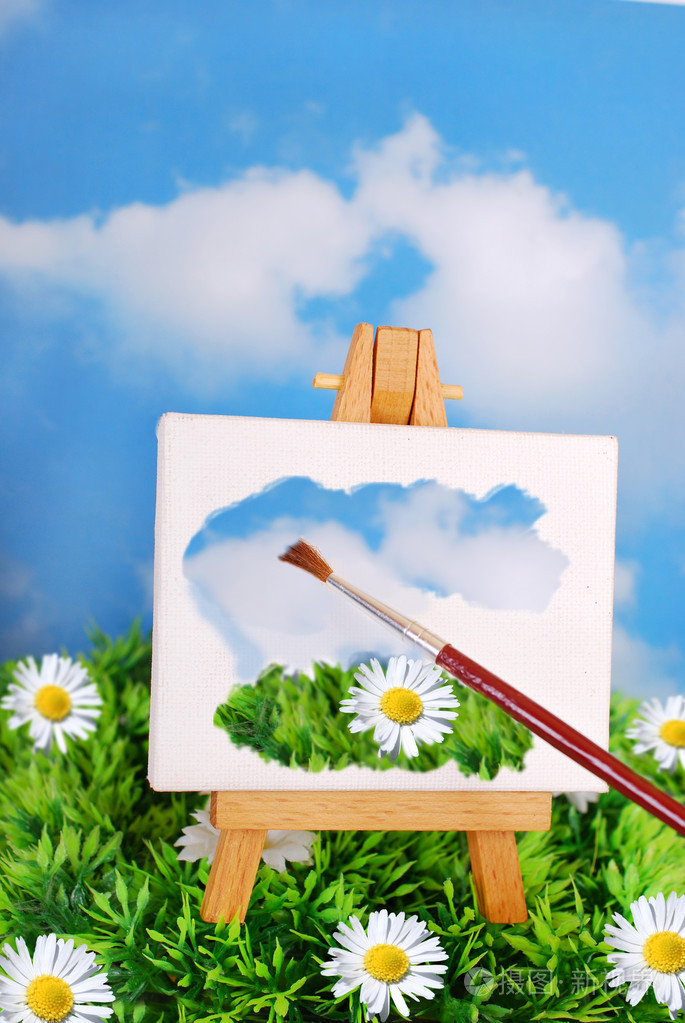 画笔绘画在画架上的春天风景