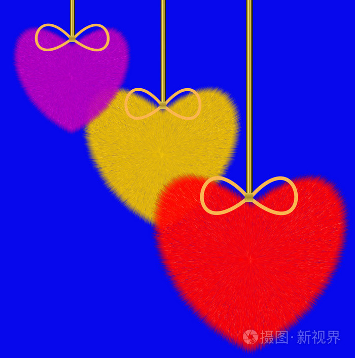蓝色背景上的三个五颜六色蓬松心