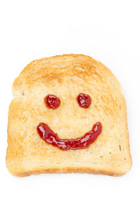 烤面包，果酱孤立在白色的微笑