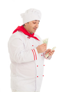 厨师该名男子手持美元身穿白色制服的风扇