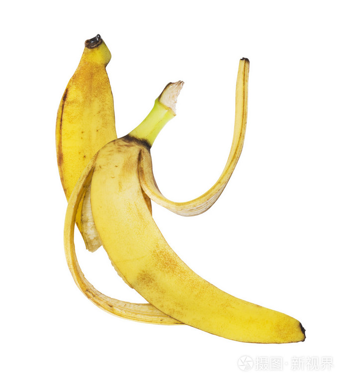 斑斑的香蕉皮在白色背景