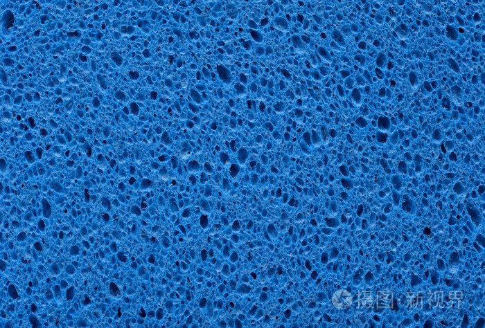 蓝色海绵与多孔纹理背景