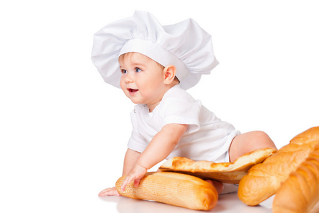 在一个盖帽与面包的小男孩