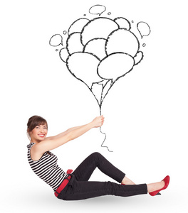 快乐的女人拿气球绘图