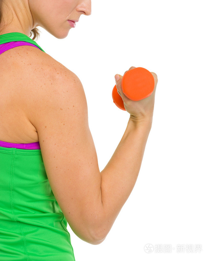 健体女人制作运动与哑铃特写