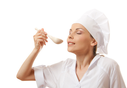 女厨师用勺子，孤立在白色吃