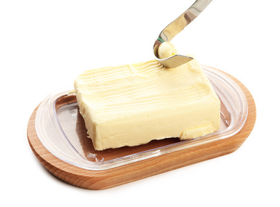 黄油和孤立在白色的刀