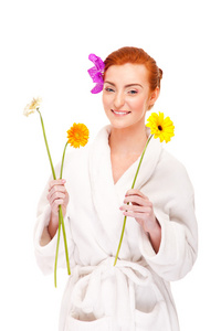 浴袍鲜花与微笑的女人
