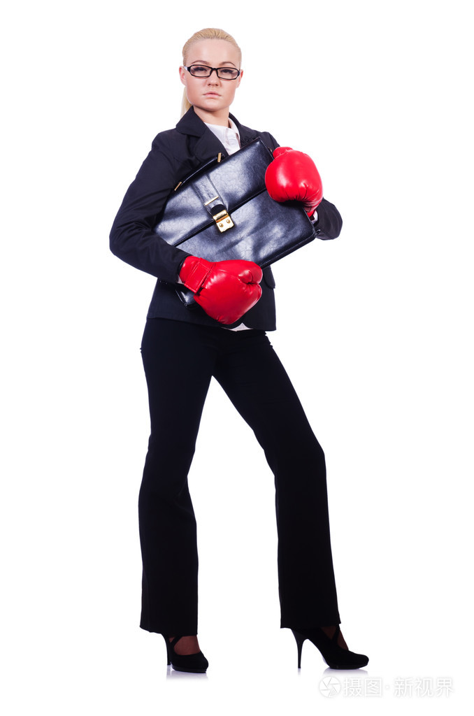 女人戴着白手套拳击的女商人