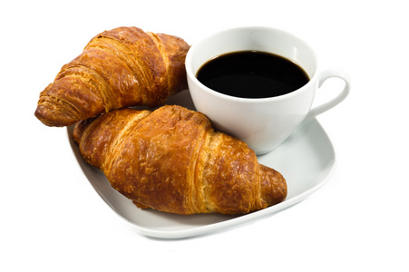 早餐喝杯黑咖啡和牛角面包